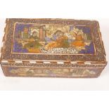 A C19th Moghul trinket box decorated with carved and painted panels of figures in interior scenes,