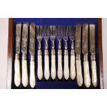 An Edwardian silver plated and mother of pearl handled canteen of cutlery, eighteen forks and