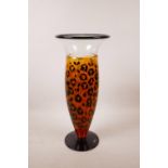 A Kosta Boda art glass vase with leopard decoration designed by 'Kjell Engman', etched to base,