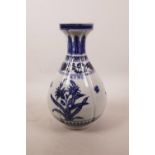 A Chinese blue and white porcelain vase of lobed form, decorated with flowers in bloom, 4