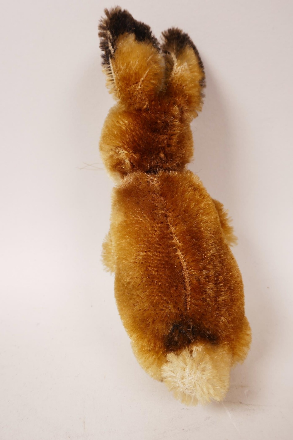 A 1952/53 Steiff begging rabbit, golden mohair, fixed limbs, brown and black glass eyes, red - Image 5 of 8