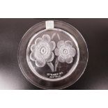 A Lalique glass plate decorated with large flowers, mark for the Lalique exhibition in Australia,