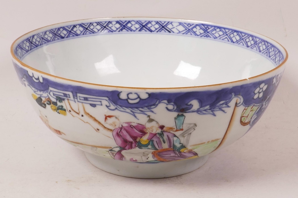 A late C19th Chinese famille rose porcelain bowl decorated with figures in garden scenes in bright