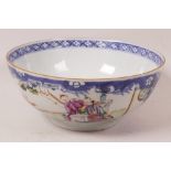 A late C19th Chinese famille rose porcelain bowl decorated with figures in garden scenes in bright
