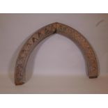 A Scandinavian carved and painted oak door arch, 61" x 40½" high
