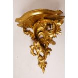 A giltwood wall bracket carved in the rococo style, 10" x 12"