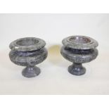 A pair of marble urns, 17" diameter, 18" high