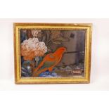 A C19th Chinese reverse painted mirror glass of a parrot and chrysanthemum, in a good C19th gilt