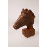 A cast iron bust of a horse's head, 12" high