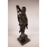 A Chinese carved wood figure of a bearded Immortal, A/F losses, 21½" high