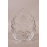 A Sino-Tibetan pressed glass shrine depicting Buddha seated on a lotus throne, 5" high