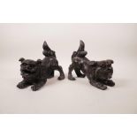 A pair of Chinese bronzed metal fo dogs, 6½" long