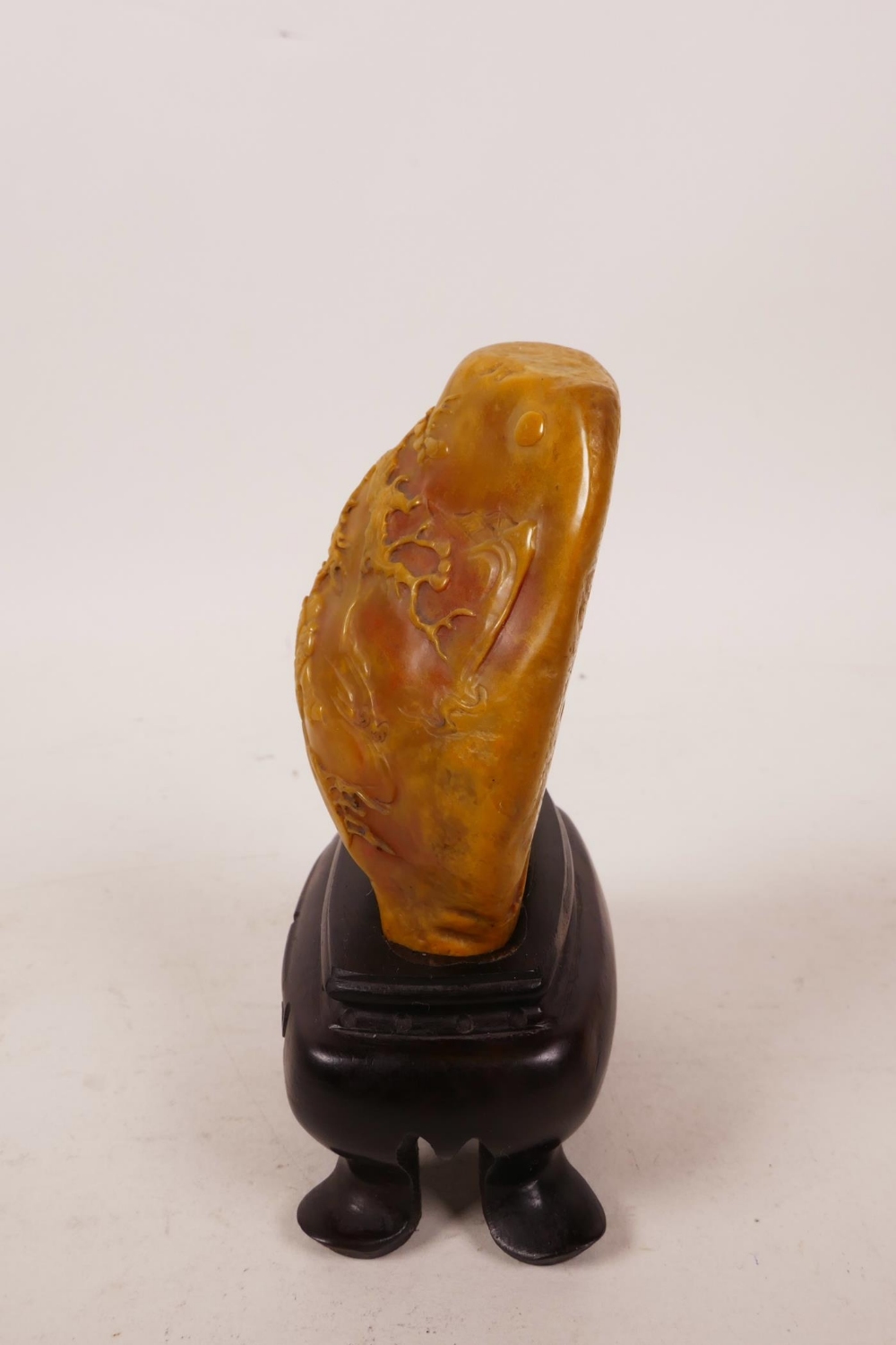 A Chinese soapstone carving of figures in a landscape, on a hardwood stand, 4" high - Image 4 of 4