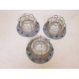 Three cast iron bulkhead lampshades, 12" diameter