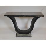 A contemporary console table with antiqued mirror glass top and base, 44" x 15" x 30"