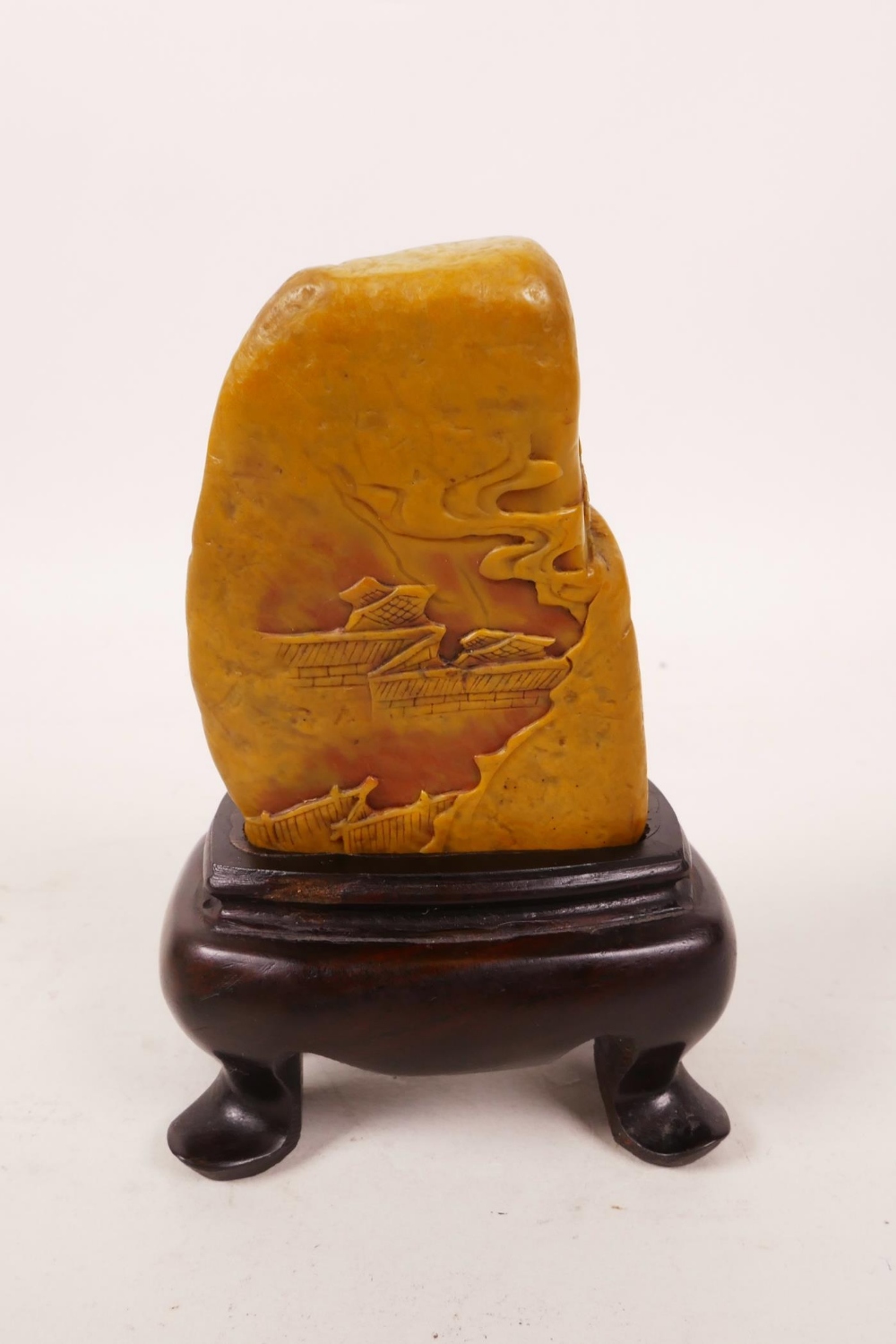 A Chinese soapstone carving of figures in a landscape, on a hardwood stand, 4" high - Image 3 of 4