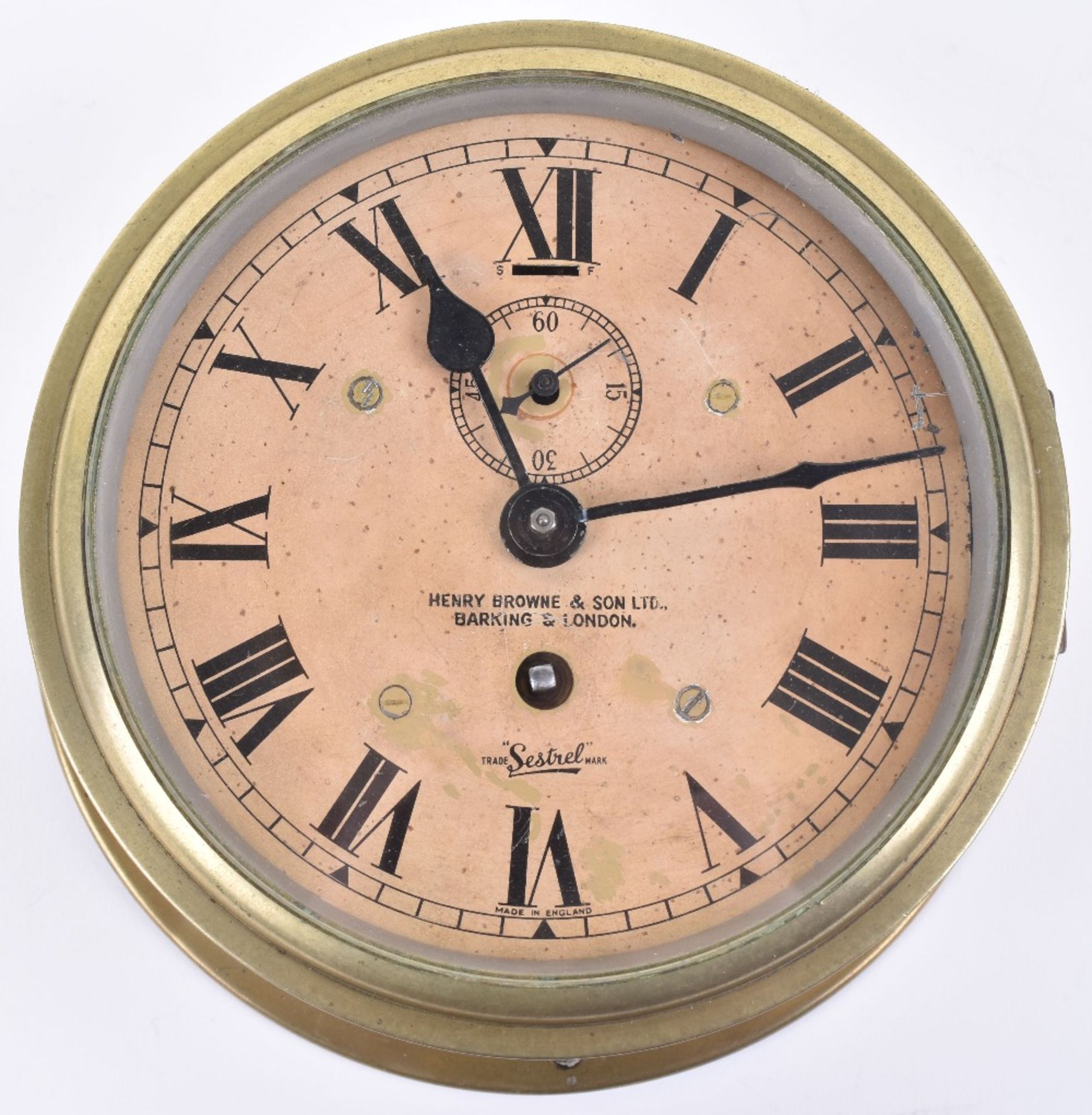 An early 20th century brass cased ships clock by Henry Browne & Son Ltd the Sestrel, with key