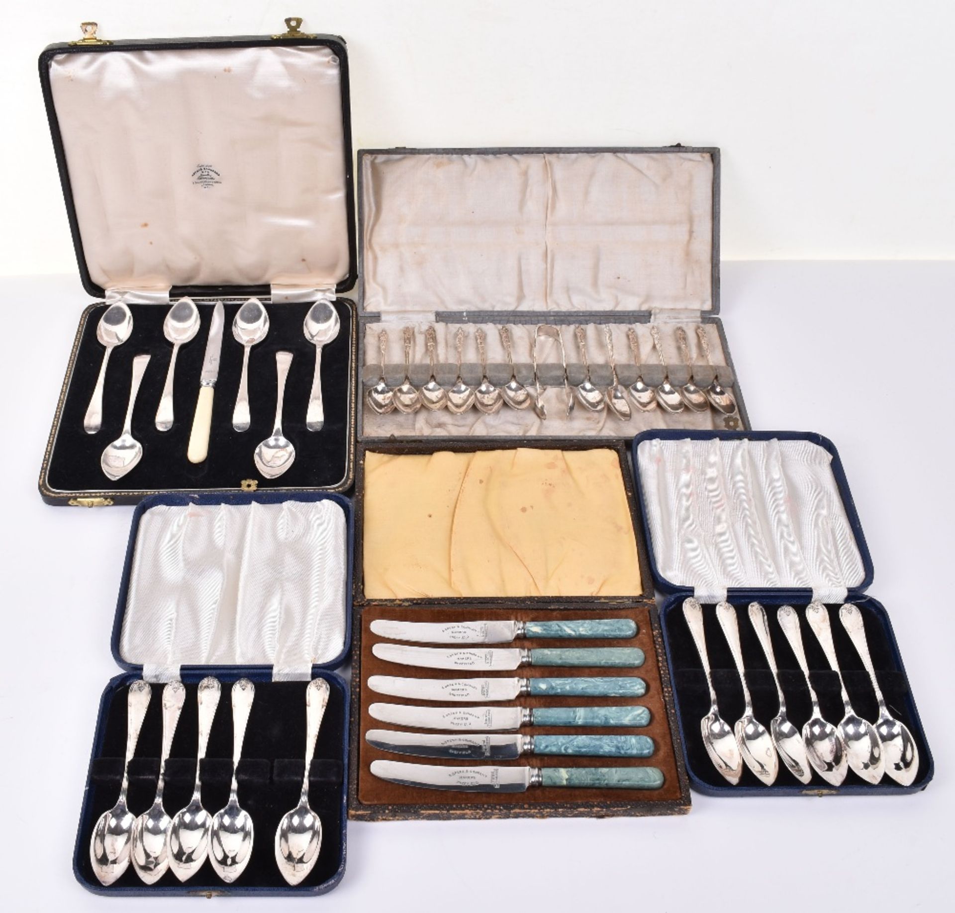 A mixed lot of boxed silver plated flatware, including a set of twelve Apostle spoons with tong, (5)