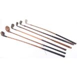 Five vintage wooden handle golf clubs