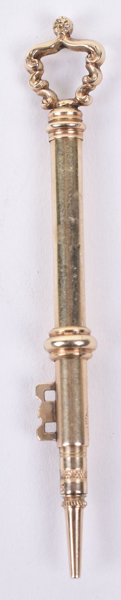 An interesting Victorian gold pencil in the form of a key, 6.5cm