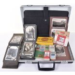 A Crown briefcase containing three folders of postcards