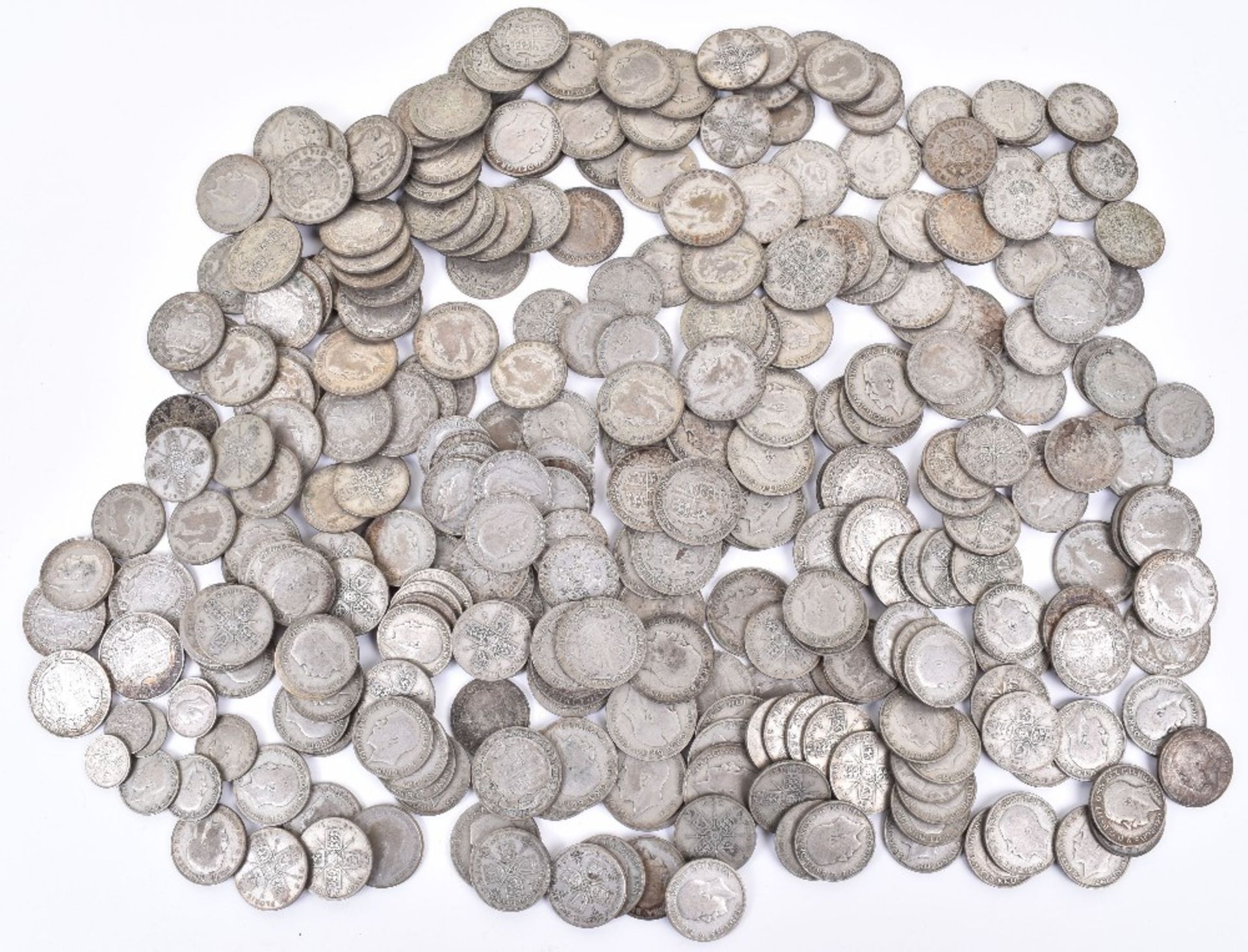 A large quantity of mainly 1920-1946 British coins, including Half Crowns, Florins, Shillings