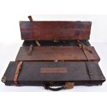 A William Evans leather and brass mounted single gun case with trade labe