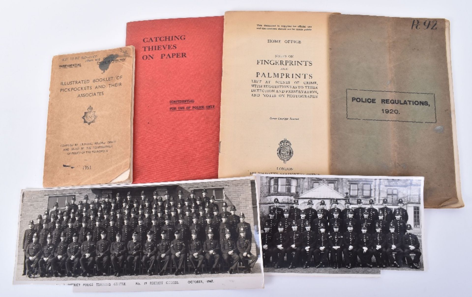 A Mixed Lot of Police Booklets and Photographs
