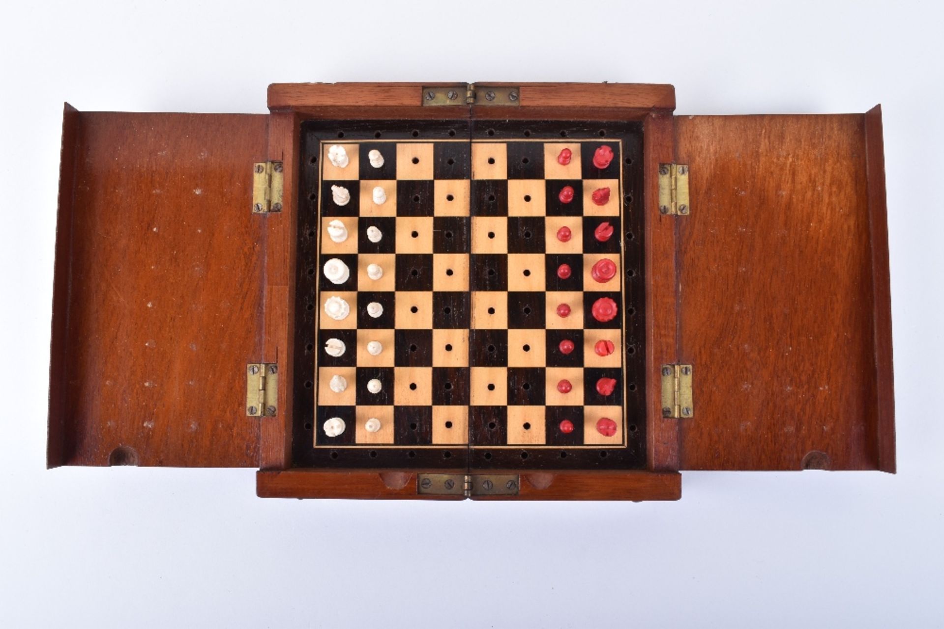 ^ Victorian Mahogany Miniature Campaign or Travelling Chess Set