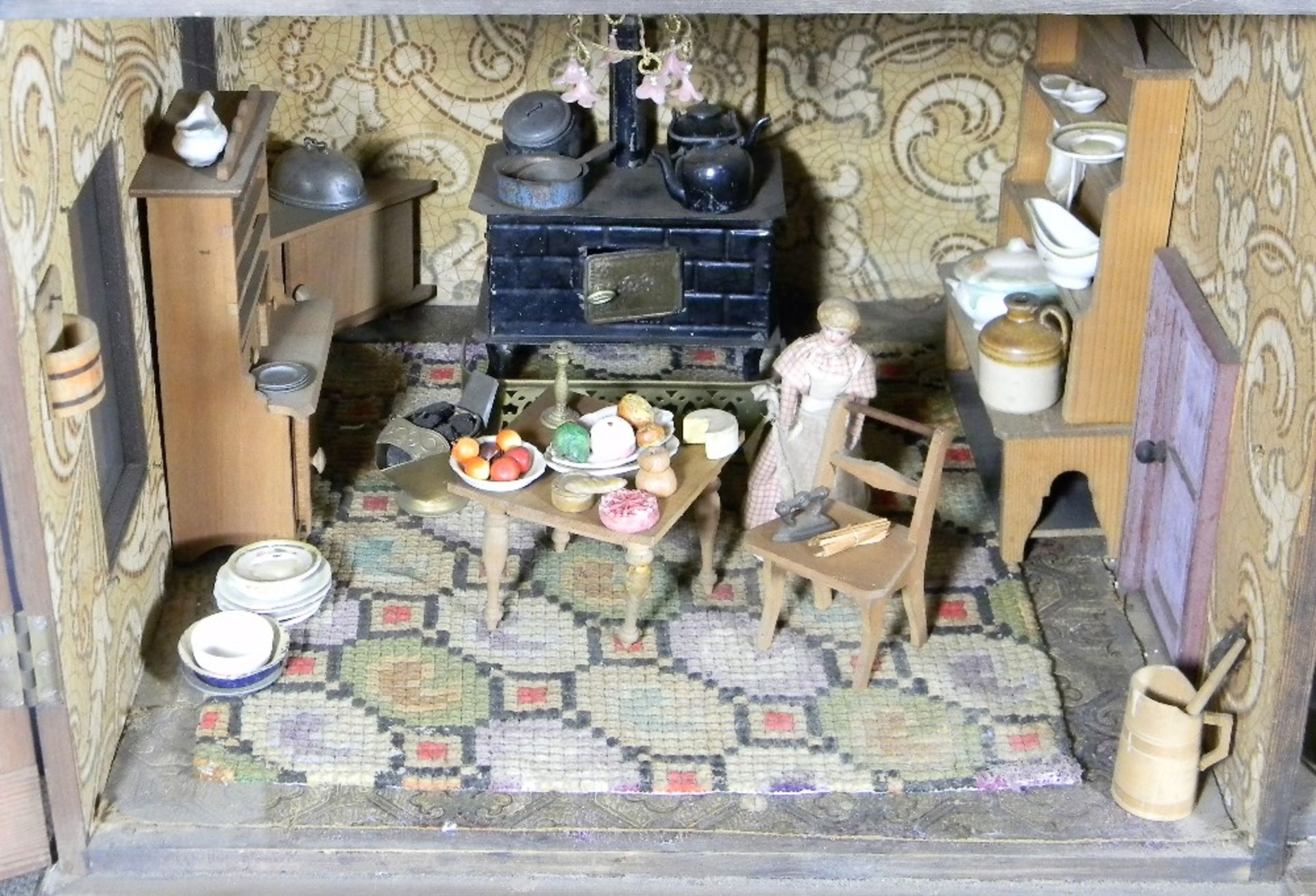 A large and impressive wooden dolls house and contents on stand, probably German circa 1880, - Image 9 of 13