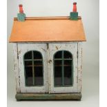 A simple painted wooden dolls house, English early 20th century,