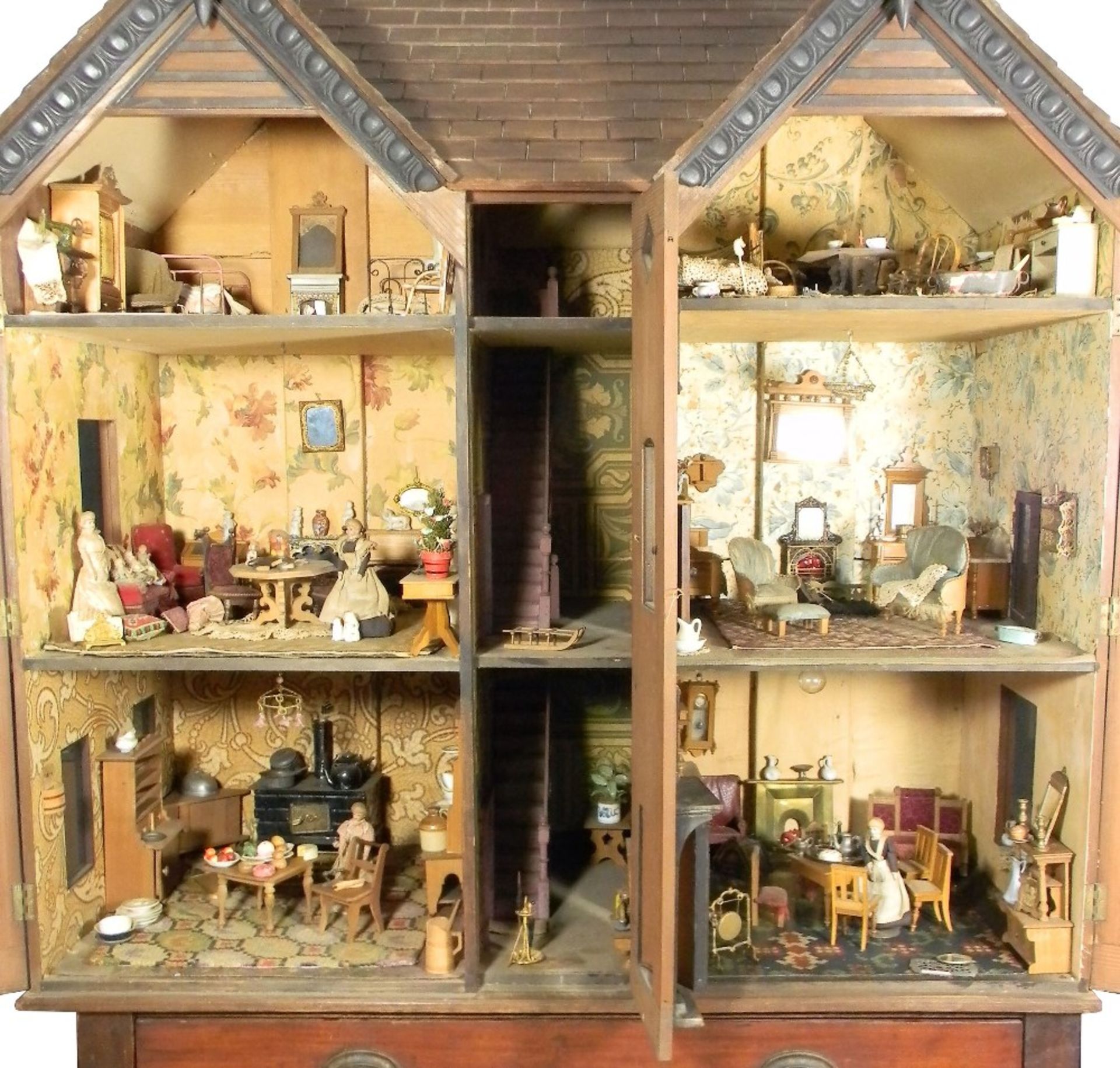 A large and impressive wooden dolls house and contents on stand, probably German circa 1880, - Image 2 of 13