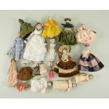 Collection of small peg wooden dolls, circa 1910,