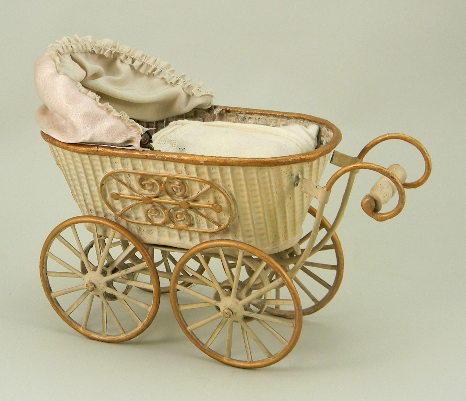 A rare Marklin embossed tinplate pram doll carriage, German circa 1900,