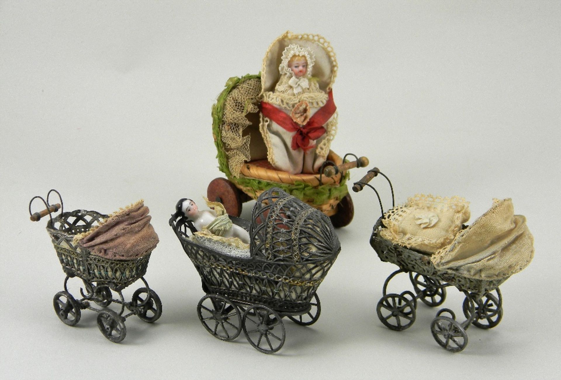 Three soft metal miniature toy prams, German circa 1900, - Image 2 of 2