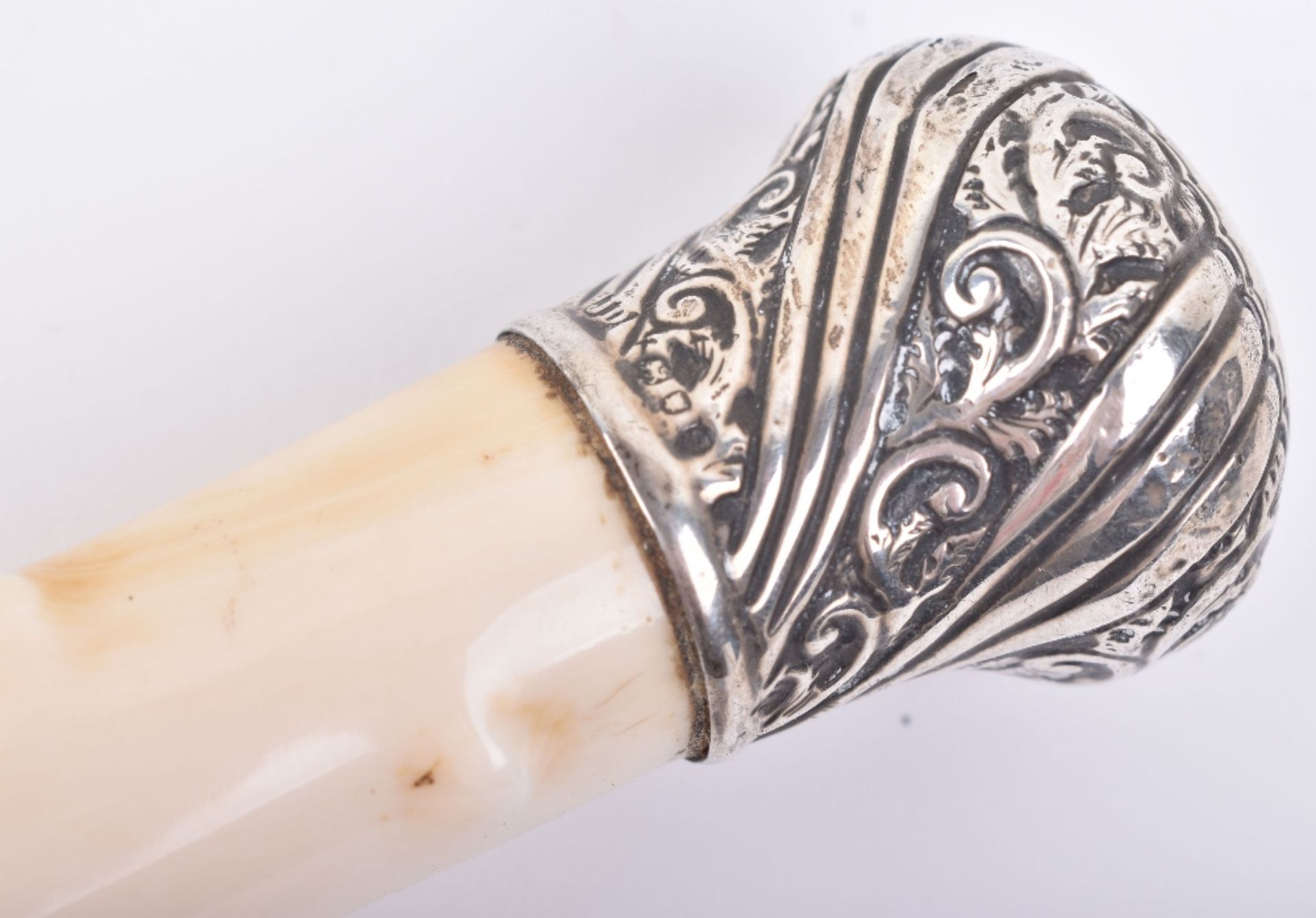 ^A fine Victorian silver and ivory walking stick, London 1893