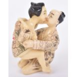 ^A 19th century Japanese carved ivory erotic study