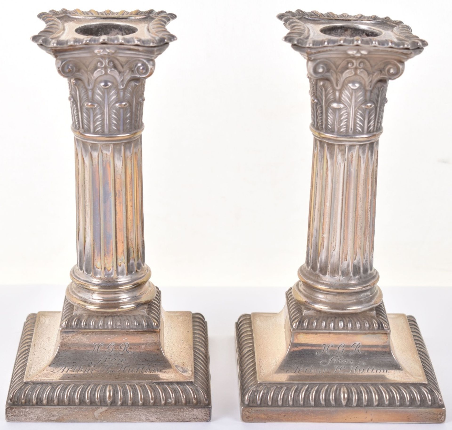 A pair of Victorian silver squat candlesticks, Hawksworth, Eyre & Co, Sheffield 1896