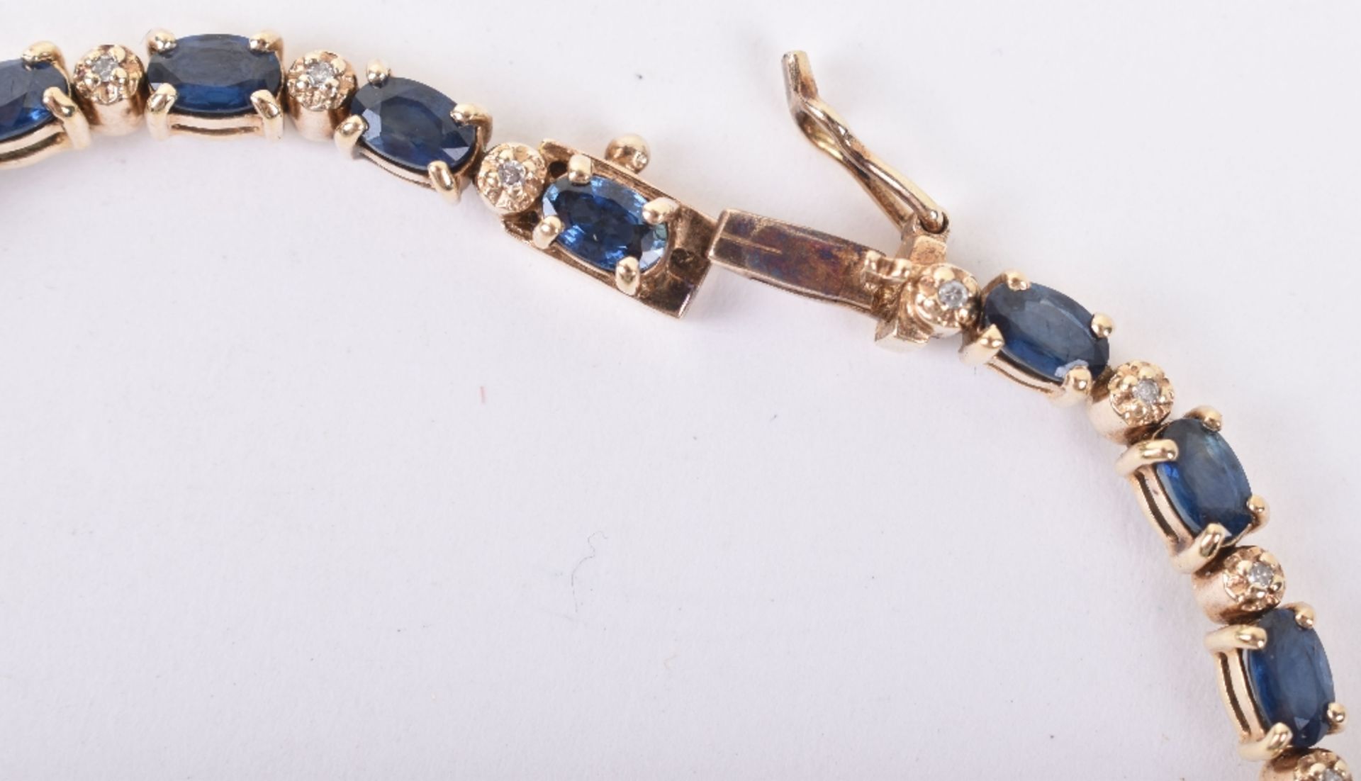 A sapphire and diamond eternity bracelet - Image 3 of 5