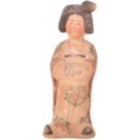 A Chinese Tang dynasty painted pottery figure of a court lady