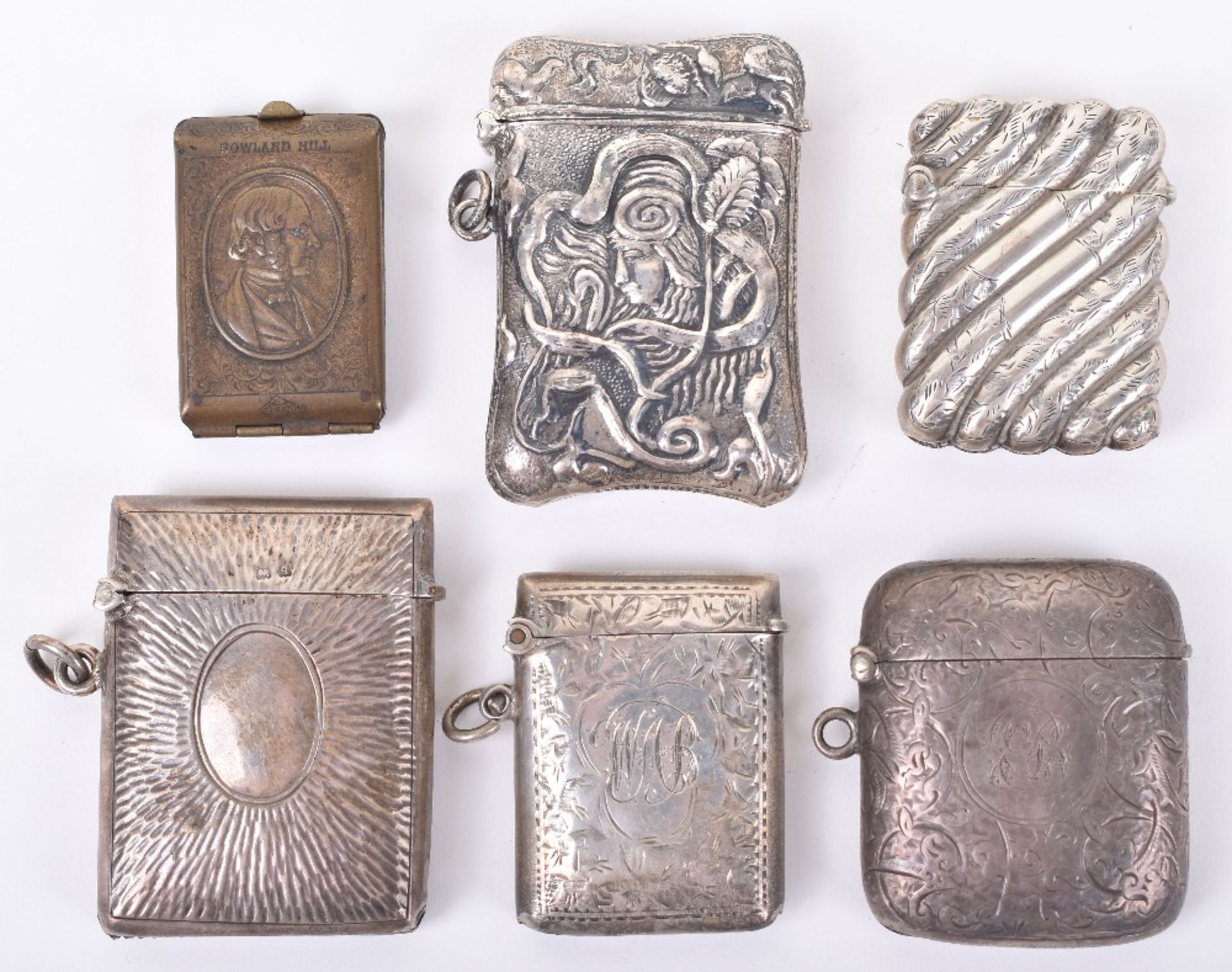 Five silver and non silver vesta cases
