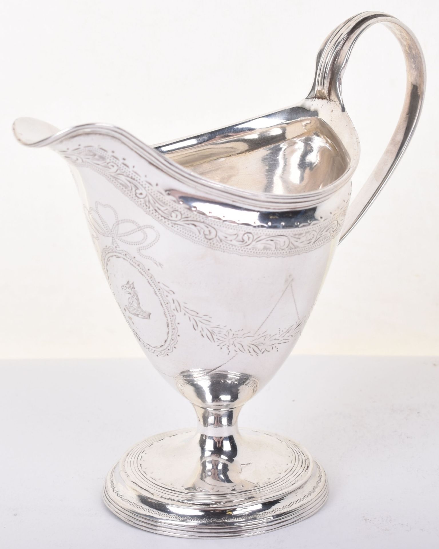 A George III silver cream jug, James Sutton, London 1793