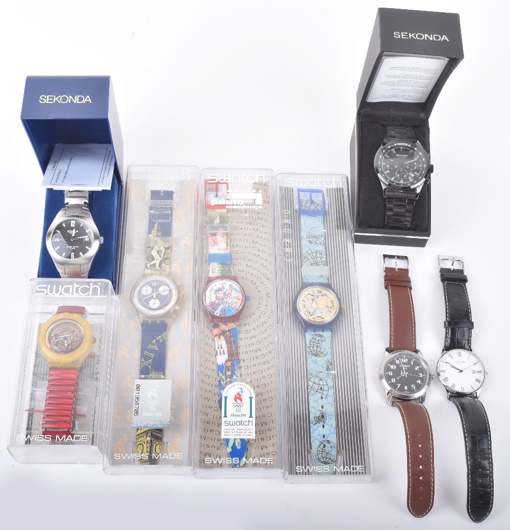 Four Swatch wristwatches, a Tissot wristwatch, a Louis Pion wristwatch and two cased Sekonda wristwa