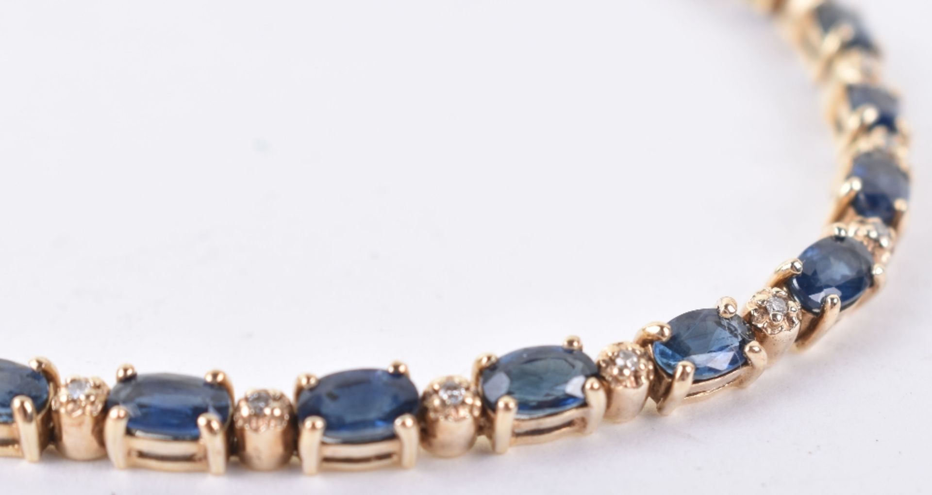 A sapphire and diamond eternity bracelet - Image 2 of 5