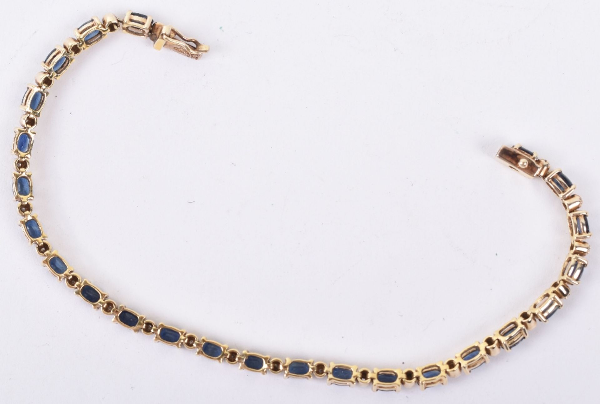 A sapphire and diamond eternity bracelet - Image 4 of 5