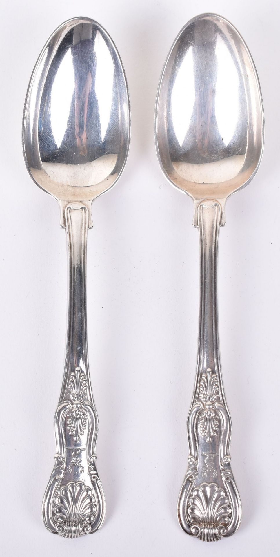 A pair of George IV fiddle and shell pattern silver spoons, by Paul Storr, London, 1821