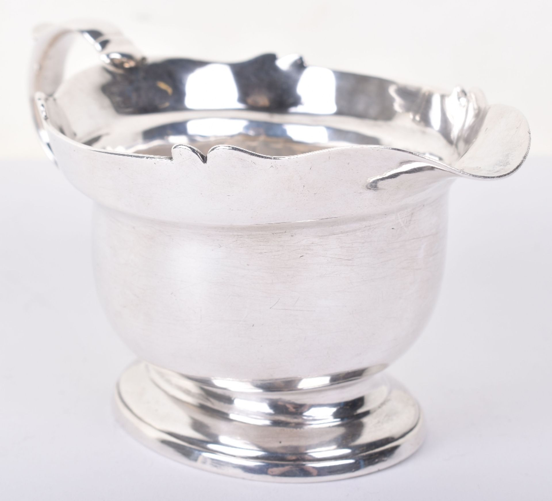 A George II silver gravy boat, by John Eckford II, London 1729 - Image 3 of 5