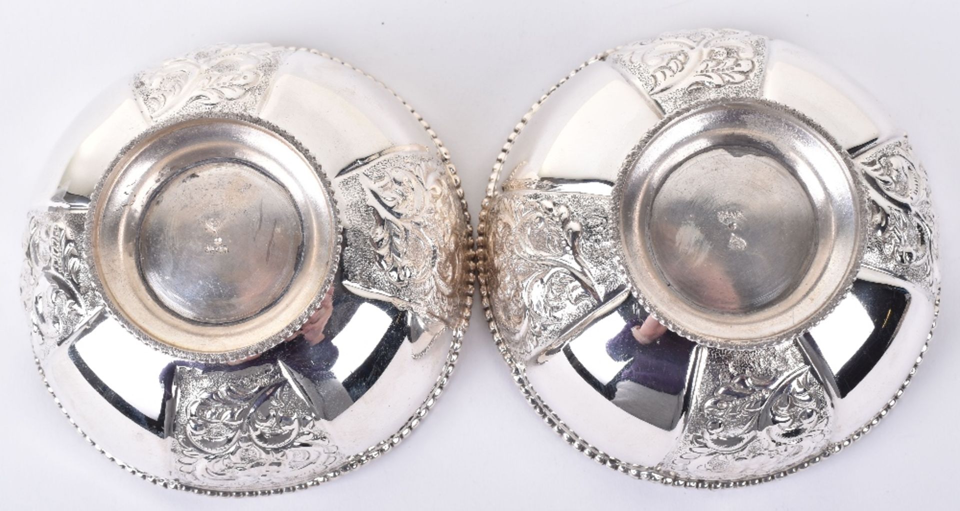 A pair of modern silver embossed bowls - Image 4 of 5