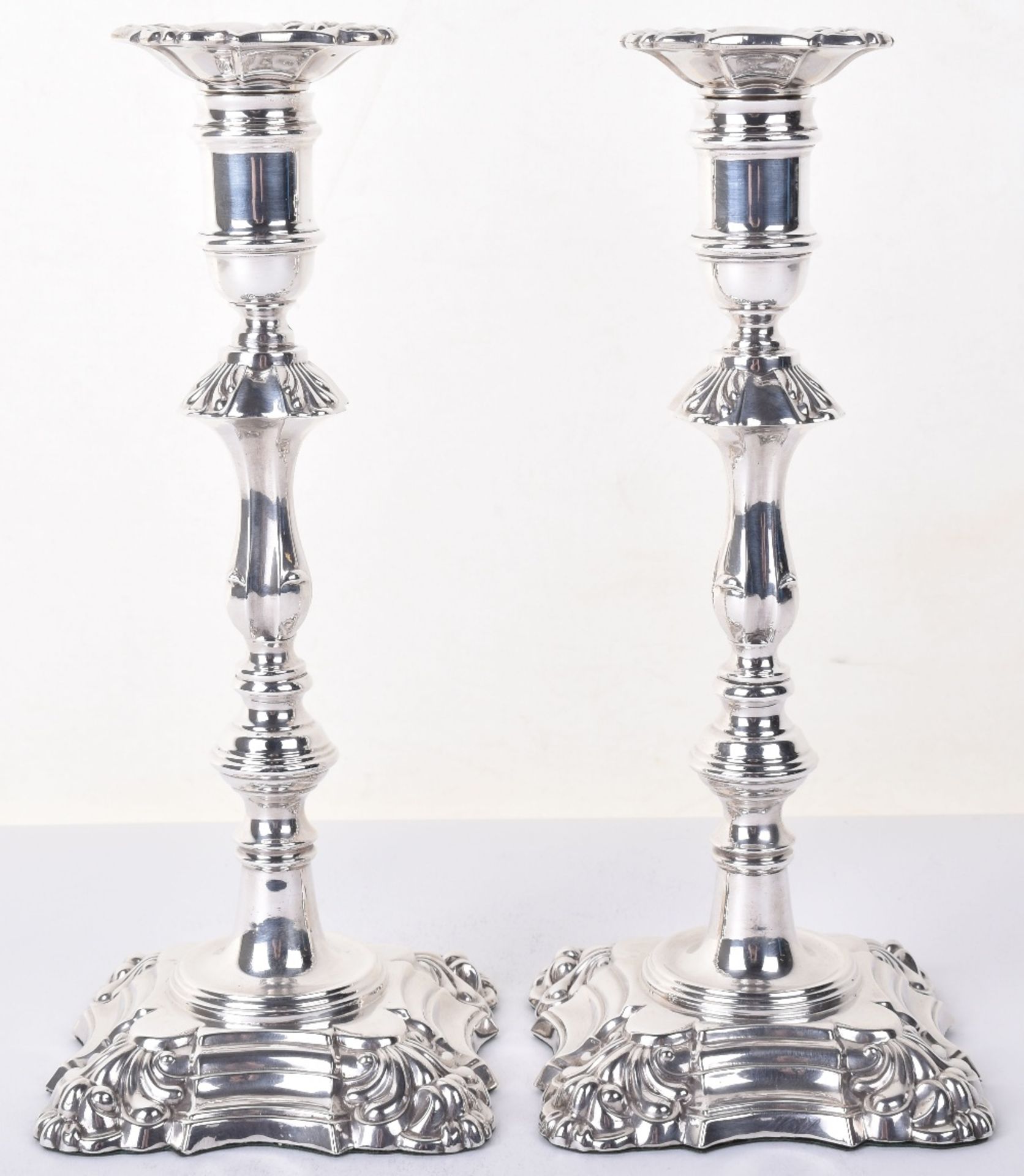 A pair of modern silver candlesticks, by David Shure, Chester 1970