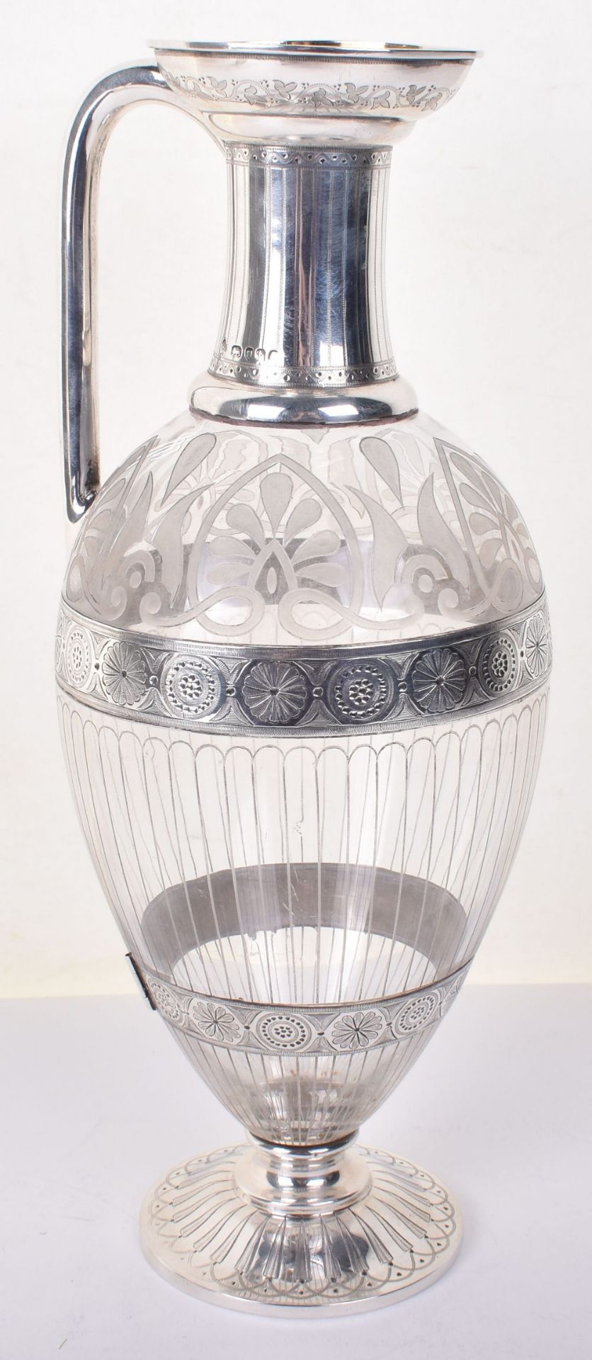 A Victorian silver and glass claret jug, by Barnard Bros, London 1874